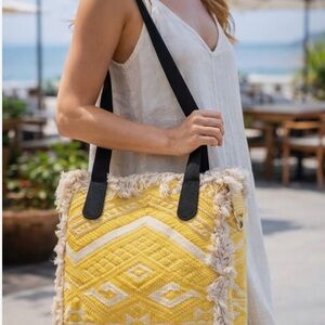 Raj Isabella Frayed Bag sold at Anthropology